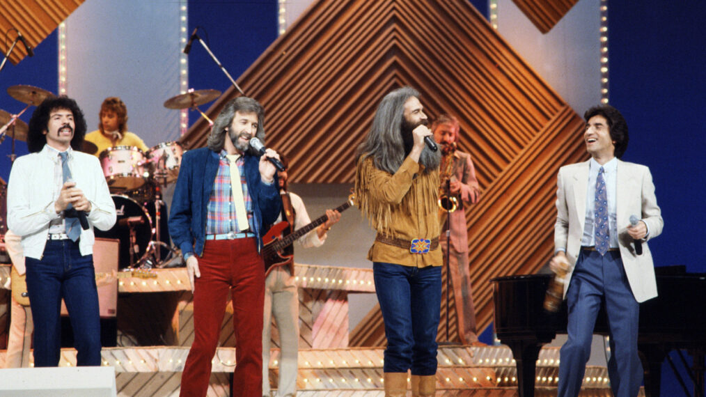 American country and gospel music singers The Oak Ridge Boys (L-R: Joe Bonsall, Duane Allen, William Lee Golden and Richard Sterban) perform on stage backed by a live band, 1982.