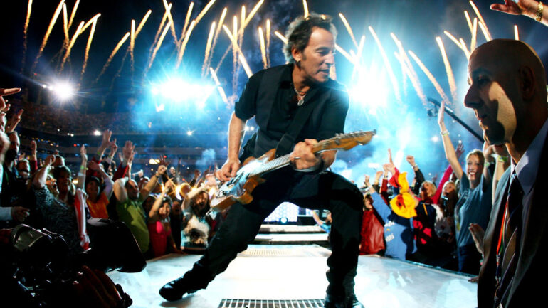 TAMPA, FL - FEBRUARY 01: Musician Bruce Springsteen and the E Street Band perform at the Bridgestone halftime show during Super Bowl XLIII between the Arizona Cardinals and the Pittsburgh Steelers on February 1, 2009 at Raymond James Stadium in Tampa, Florida.