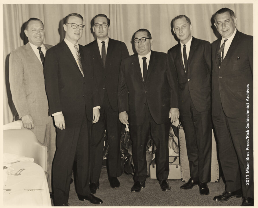 Contract signing at the TIME-LIFE Building in New York May, 1965, when one of the three picture deal was known as "Monster Convention" Contract between Joesph E. Levine's Embassy Pictures and Rankin/Bass Productions/Videocraft International. From Left to right: Embassy associate, Arthur Rankin, Jr., Jules Bass, Joseph E. Levine, Musical composer Maury Laws and Embassy assocaite.