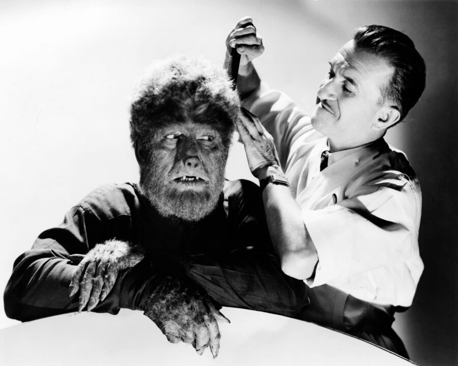 THE WOLF MAN, from left: Lon Chaney Jr., makeup artist Jack Pierce, on set, 1941