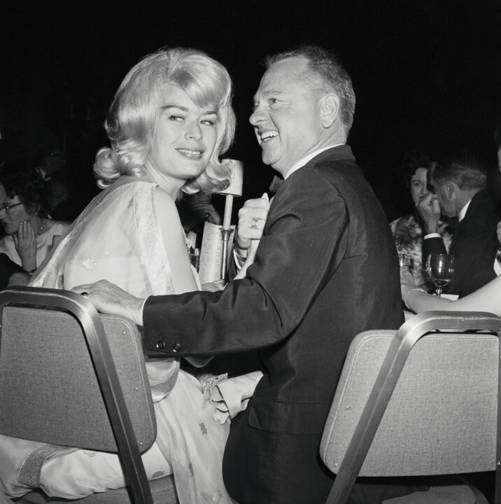 (Original Caption) Hollywood, Los Angeles, California: Mickey Rooney and wife are shown as they attended the Golden Globe award ceremonies last night. The award is an annual affair sponsored by the Hollywood Foreign Press Association. March 17, 1961.