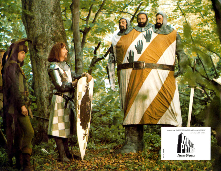 MONTY PYTHON AND THE HOLY GRAIL, from left: Neil Innes, Eric Idle, three heads from left: Terry Jones, Graham Chapman, Michael Palin, 1975