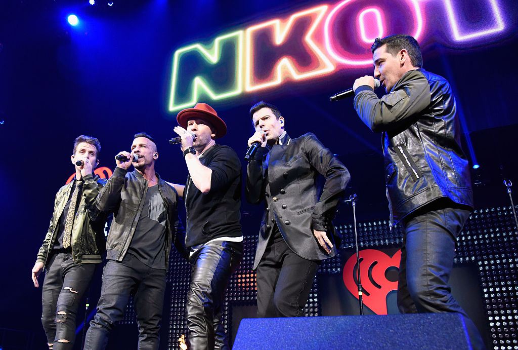 SAN JOSE, CA - JANUARY 28: (L-R) Musicians Danny Wood, Joey McIntyre, Donnie Wahlberg, Jordan Knight and Jonathan Knight of New Kids on the Block perform on stage during the iHeart80s Party 2017 at SAP Center on January 28, 2017 in San Jose, California