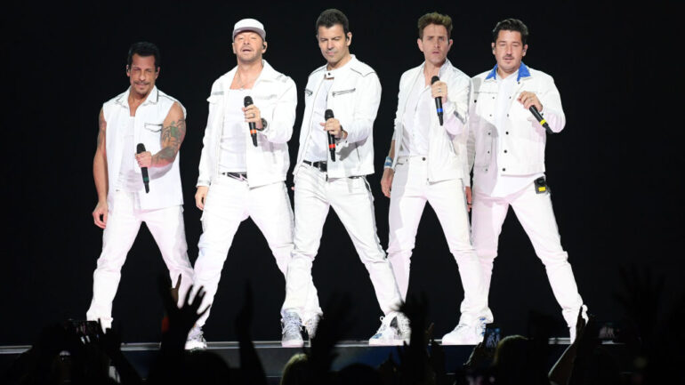 NASHVILLE, TENNESSEE - MAY 09: Danny Wood, Donnie Wahlberg, Jordan Knight, Joey McIntyre and Jonathan Knight of the musical group New Kids On The Block perform at Bridgestone Arena on May 09, 2019 in Nashville, Tennessee