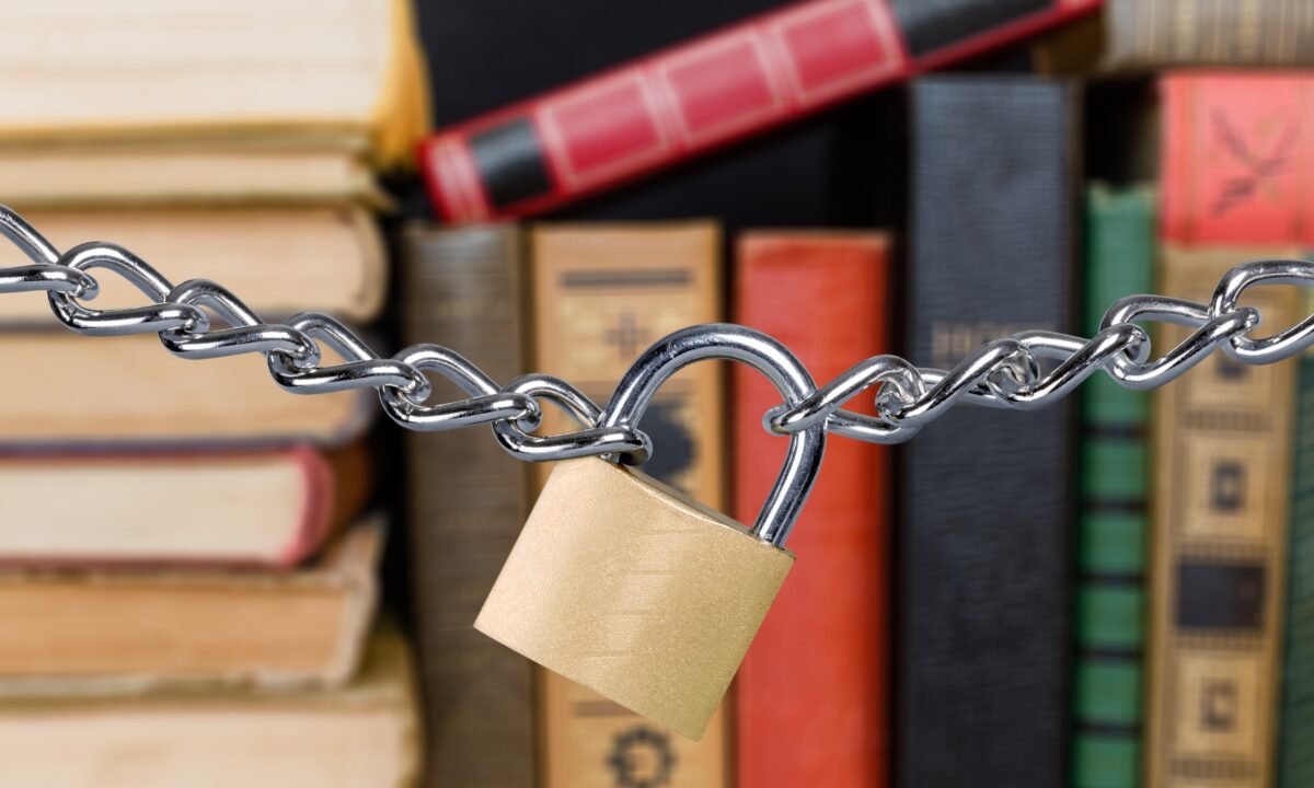 Stock photo of books with lock and chain