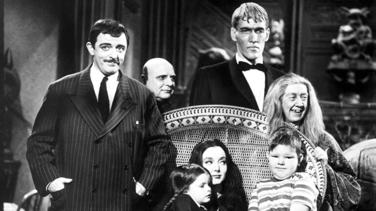 ADDAMS FAMILY, [standing] John Astin, Jackie Coogan, Ted Cassidy, Blossom Rock, (aka Marie Blake), [sitting] Lisa Loring, Carolyn Jones, Ken Weatherwax, 1964-1966