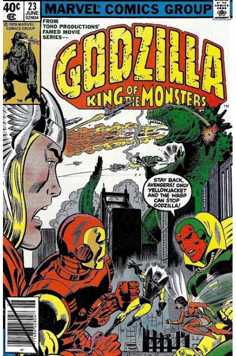 cover of the June 1979 issue of Marvel Comics' "Godzilla, King of the Monsters." In the background of the image, a giant green Godzilla is looming over skyscrapers in a city's downtown, looking toward the right and breathing fire at oncoming fighter jets. The monster is crushing one of the jets in his right hand. In the foreground of the image, Marvel Avengers (from left to right) Thor, Iron Man, Yellowjacket, Vision and Wasp, are looking at the scene in astonishment. A word balloon coming from Vision shows him to be saying: "Stay back, Avengers! Only Yellowjacket and the Wasp can stop Godzilla!"