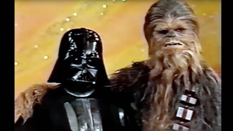A DISTURBANCE IN THE FORCE, scene from THE STAR WARS HOLIDAY SPECIAL, from left: Darth Vader, Peter Mayhew, 1978, 2023