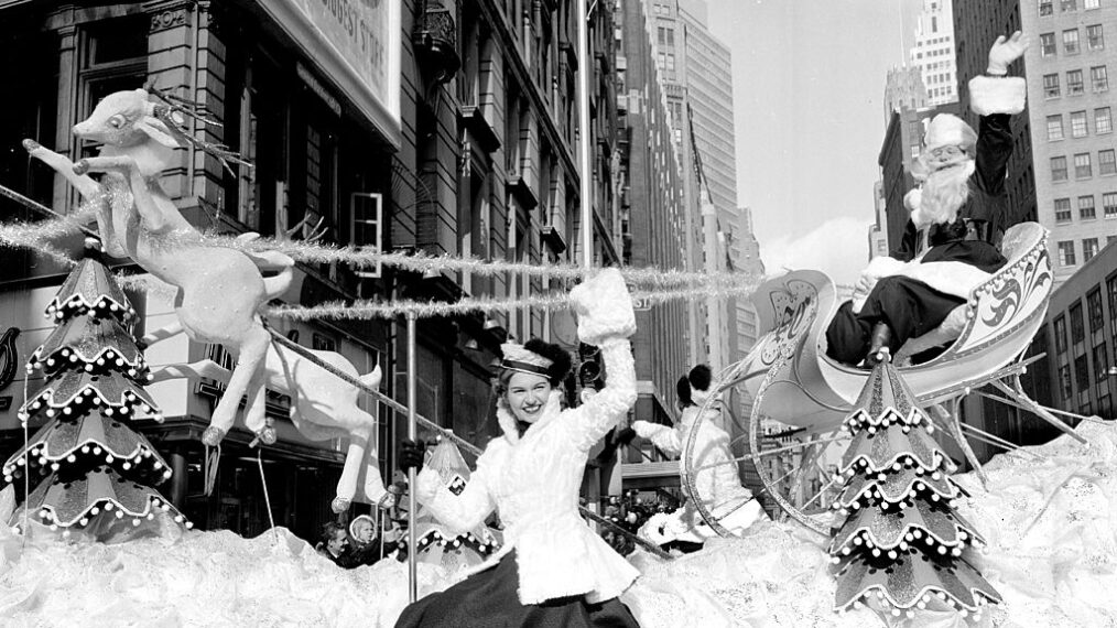 Santa Claus, star of annual Macy's Thanksgiving Day parade waves a greeting to spectators