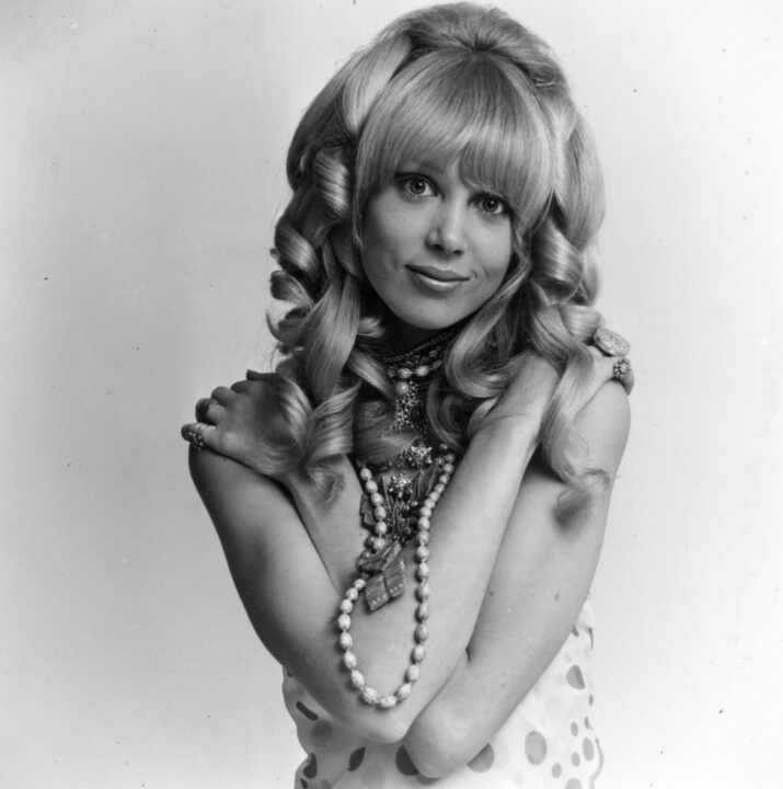 26th June 1967: Fashion model Pattie Boyd, wife of Beatle George Harrison, modelling a wig