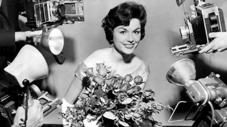 UNITED STATES - DECEMBER 30: Miss Robbin Bain who won the title of Miss Rheingold 1959 during the announcement at the Waldorf-Astoria Hotel. The contest drew 24 million votes second only to the number of ballots cast during a presidential election.
