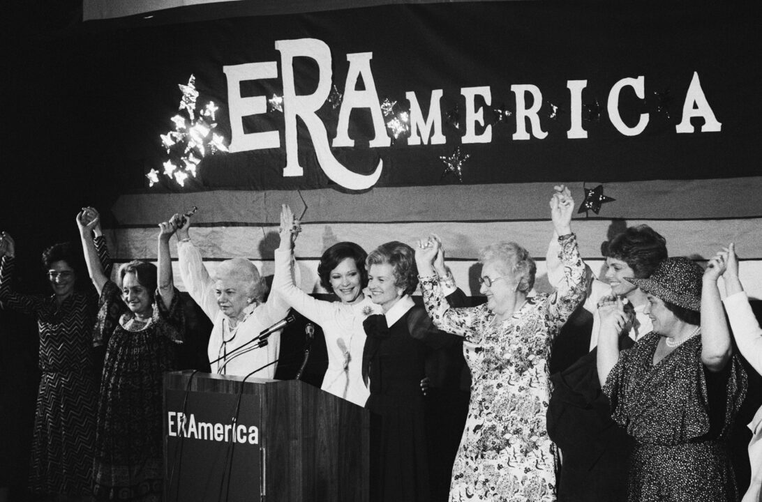 (Original Caption) 11/18/1977-Houston, TX- In Houston to attend the National Women's Conference, a group of some of the most well-known women in America appears on stage at a gala fund-raiser to support the campaign for the Equal Rights Amendment. They are (L-R): Betty Friedan, Liz Carpenter, First Lady Rosalynn Carter, former first lady Betty Ford, Elly Peterson, Jill Ruckelshaus and Bella Abzug.
