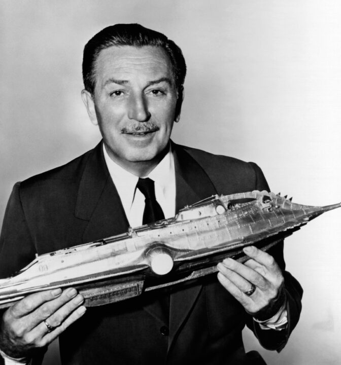20,OOO LEAGUES UNDER THE SEA, producer Walt Disney holding a model of the submarine Nautilus, 1954