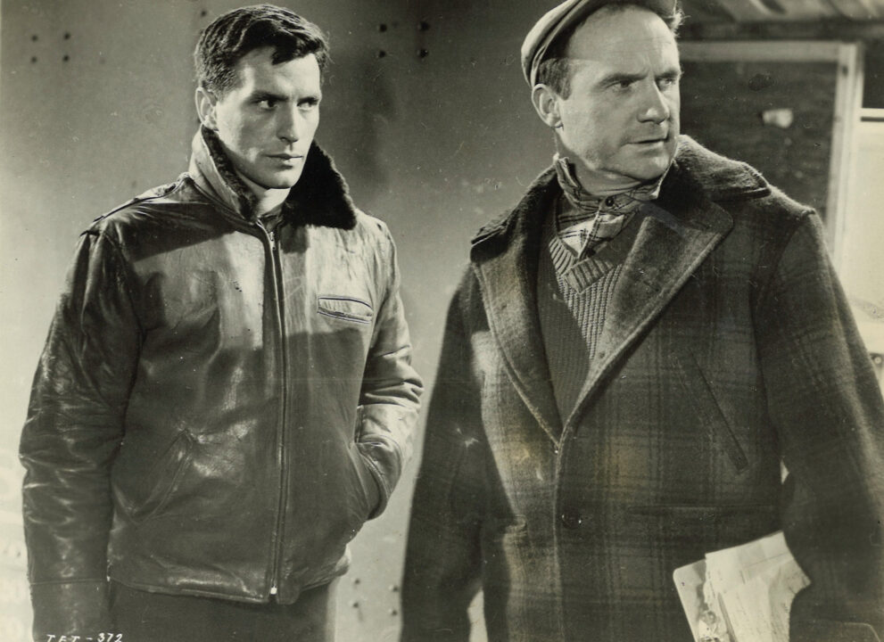 black and white image from the 1957 film "Edge of the City," with characters played by John Cassavetes (on left) and Jack Warden looking intense.