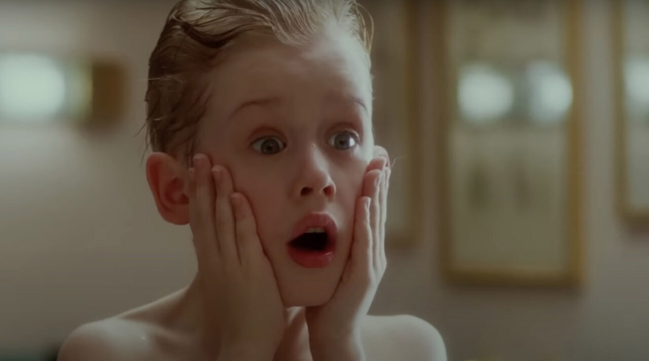 image from the 1990 movie "Home Alone." It is the famous shot of star Macaulay Culkin looking surprised after he slaps some stinging aftershave on his face.