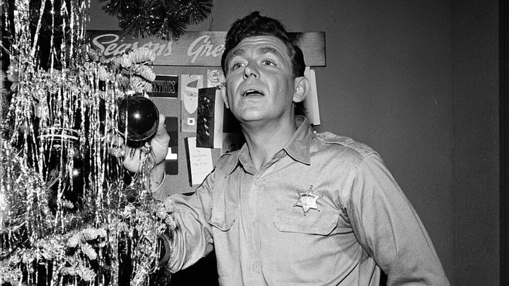 Andy Griffith as Sheriff Andy Taylor stands next to a Christmas tree in an episode of 'The Andy Griffith Show,' Los Angeles, California, October 18, 1960. The episode, titled 'Christmas Story,' aired on December 19, 1960