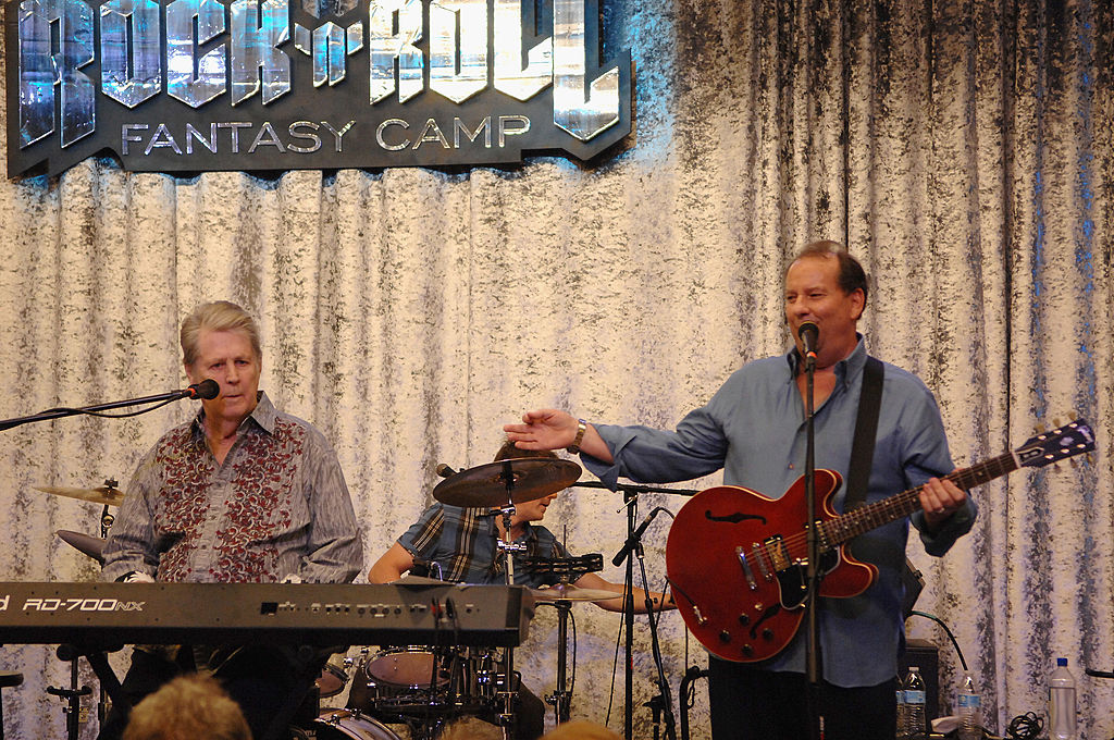 Musician's Brian Wilson (L) and Jeffrey Foskett perform during Rock 'n' Roll Fantasy Camp on April 21, 2013 in Las Vegas, Nevada