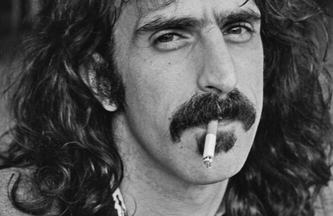 American singer and musician Frank Zappa (1940 - 1993) during a press conference at the Royal Garden Hotel in London, UK, 5th September 1974
