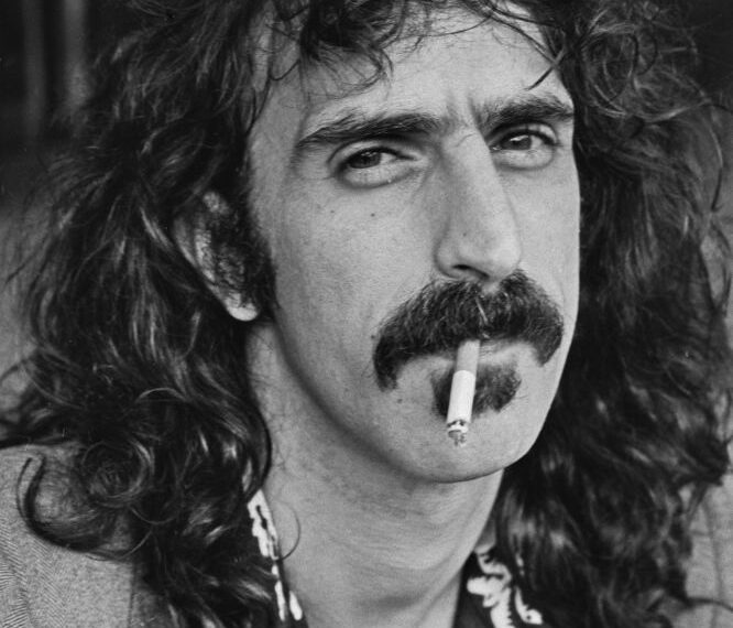 American singer and musician Frank Zappa (1940 - 1993) during a press conference at the Royal Garden Hotel in London, UK, 5th September 1974