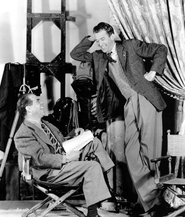 Frank Capra, James Stewart on the set of IT'S A WONDERFUL LIFE, 1946