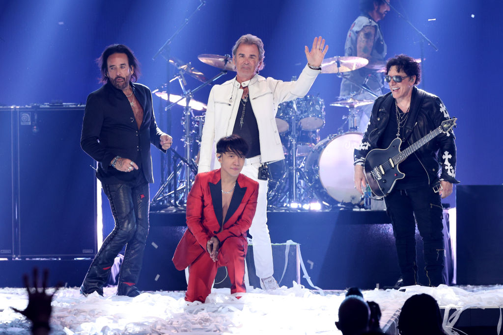 Marco Mendoza, Arnel Pineda, Jonathan Cain, and Neal Schon of Journey perform onstage during the 2021 iHeartRadio Music Festival on September 18, 2021 at T-Mobile Arena in Las Vegas, Nevada