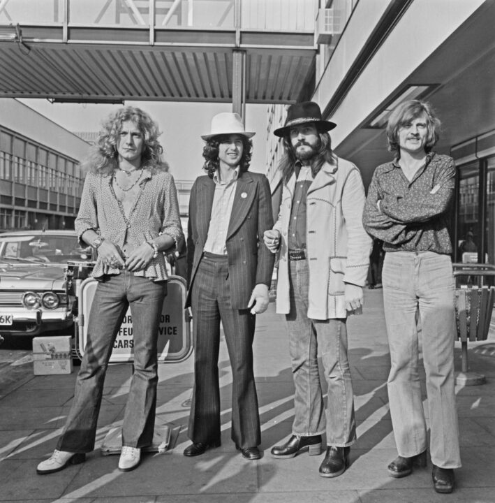 English rock band Led Zeppelin at Heathrow Airport in London, UK, 11th June 1973. From left to right, they are singer Robert Plant, guitarist Jimmy Page, drummer John Bonham (1948 - 1980) and bassist/keyboard player John Paul Jones