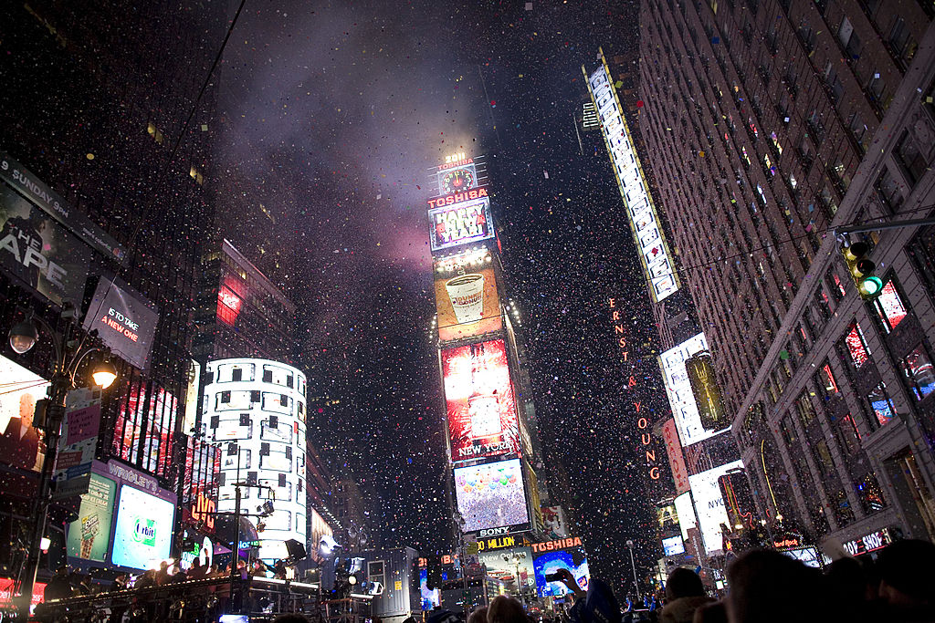 Confetti flies through the air in Times Square just after the annual ball drop January 01, 2011 in New York City. This year a 11,875-pound Waterford crystal ball descended a 141-foot tall flagpole to mark the beginning of 2011