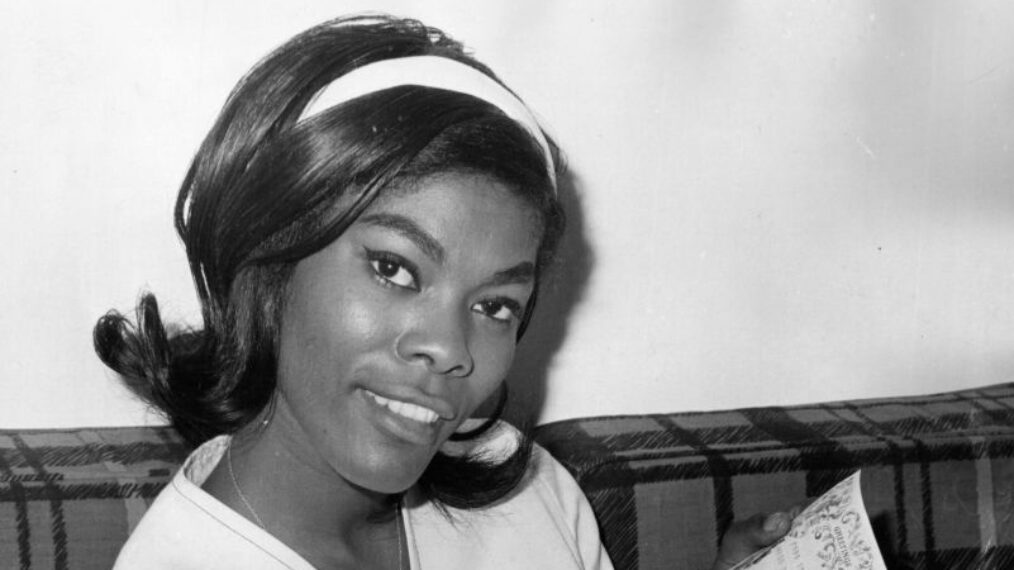 American singer Dionne Warwick reading a well-wishing telegram from Dusty Springfield at her London hotel, 20th May 1964