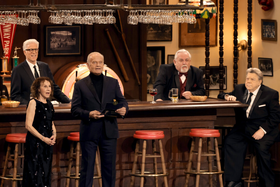 LOS ANGELES, CALIFORNIA - JANUARY 15: (L-R) Ted Danson, Rhea Perlman, Kelsey Grammer, John Ratzenberger, George Wendt speak onstage during the 75th Primetime Emmy Awards at Peacock Theater on January 15, 2024 in Los Angeles, California.