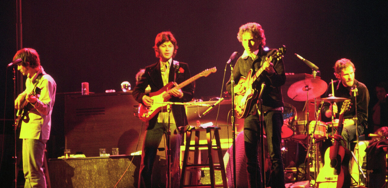 Bob Dylan and the Band 1974 https://en.wikipedia.org/wiki/Bob_Dylan_and_the_Band_1974_Tour#/media/File:Bob_Dylan_and_The_Band_-_1974.jpg