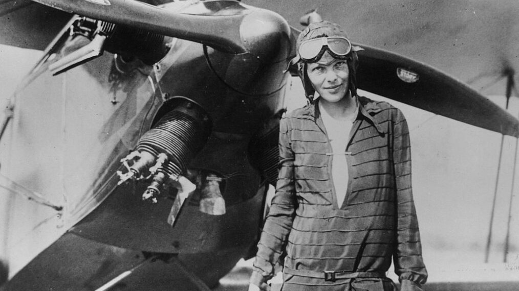 Amelia Earhart stands June 14, 1928 in front of her bi-plane called 