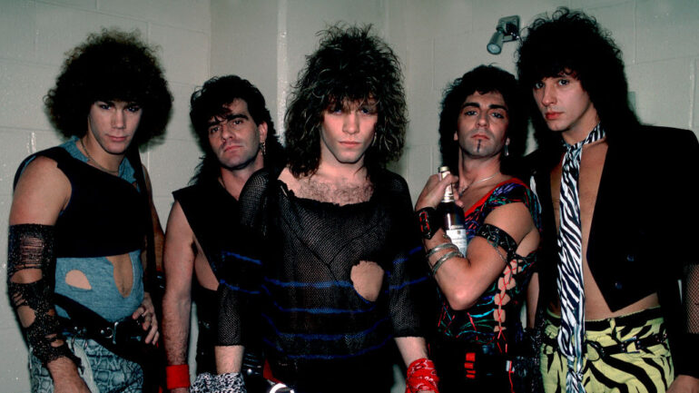 Portrait of American rock band Bon Jovi backstage before a performance at the Rosemont Horizon, Rosemont, Illinois, May 20, 1984. Pictured are, from left, David Bryan, Tico Torres, Jon Bon Jovi, Alec John Such, and Richie Sambora