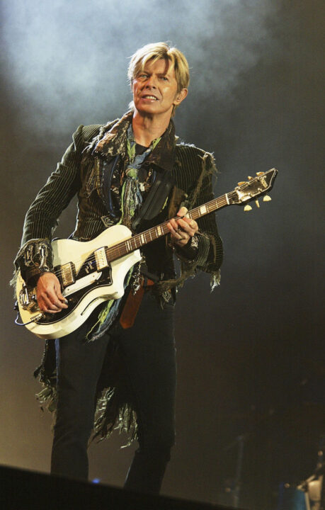 David Bowie performs on stage on the third and final day of "The Nokia Isle of Wight Festival 2004" at Seaclose Park, on June 13, 2004 in Newport, UK. The third annual rock festival takes place during the Isle of Wight Festival which runs from June 4-19