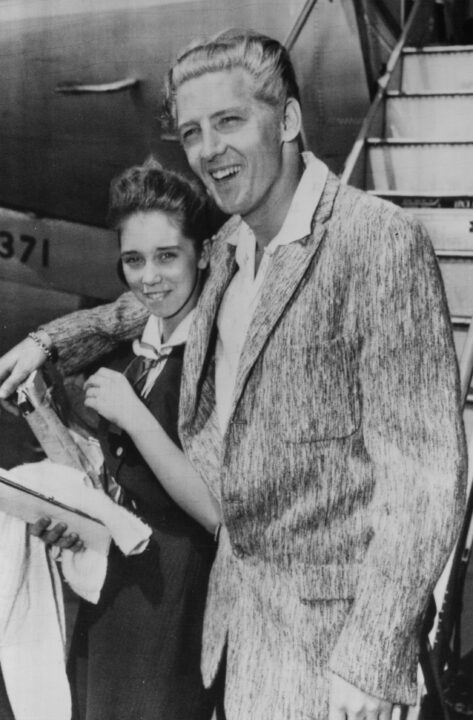 MPP5/28 Memphis: Smiling couple, rock 'n' roll star Jerry Lee Lewis and child bride Myra, 13 flew home to Memphis from London. "I'd marry her lOO times if necessary" he told newsmen. His marriage to Myra was disclosed in London while Lewis was on tour. Fact that he married her five months before his divorce from second wife, caused furore, cancelled his London tour.United Press International (Memphis do not use) ls-- United Press Telephoto Central Press Association June 2, 1958