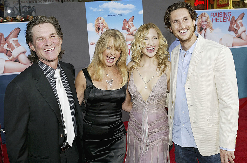Actor Kurt Russell and his partner, actress Goldie Hawn, and her children, actress Kate Hudson and actor Oliver Hudson, attend the film premiere of the romantic comedy "Raising Helen" on May 26, 2004 at the El Capitan Theatre, in Hollywood, California