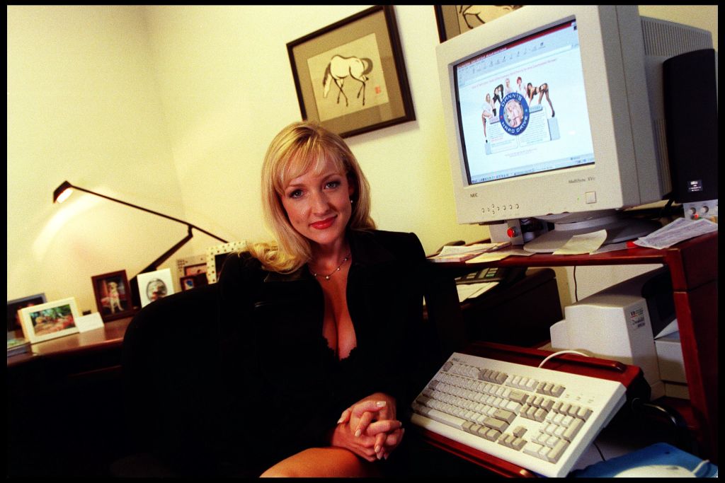 Business woman Danni Ashe poses in her office August 30, 2000 in Culver City, CA. Ashe owns "Danni Hard Drive" and is the host of the most downloaded internet show "In bed with Danni."