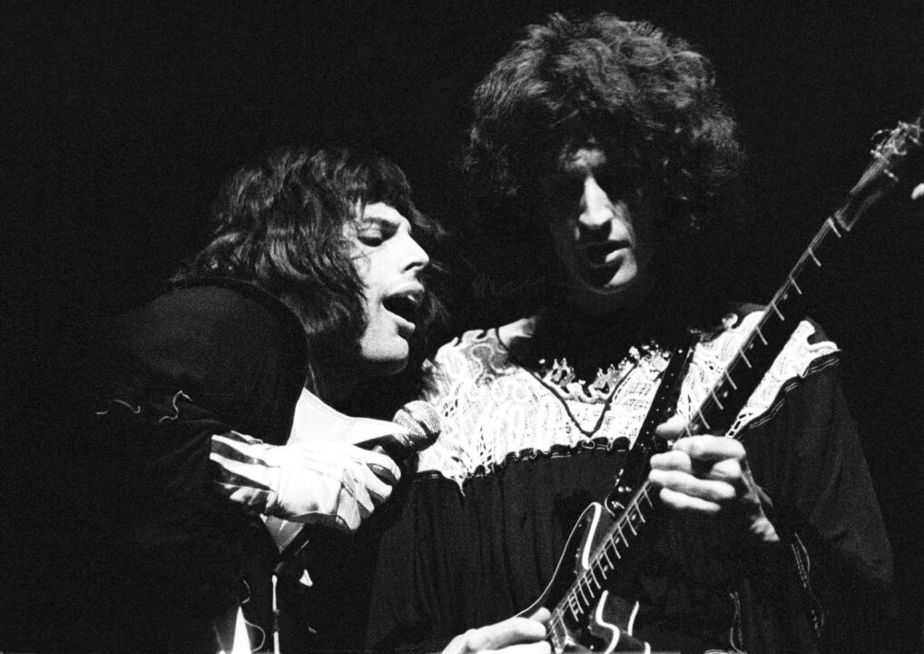 UNITED KINGDOM - JANUARY 01: Photo of QUEEN and Freddie MERCURY and Brian MAY; Freddie Mercury and Brian May performing live on stage 