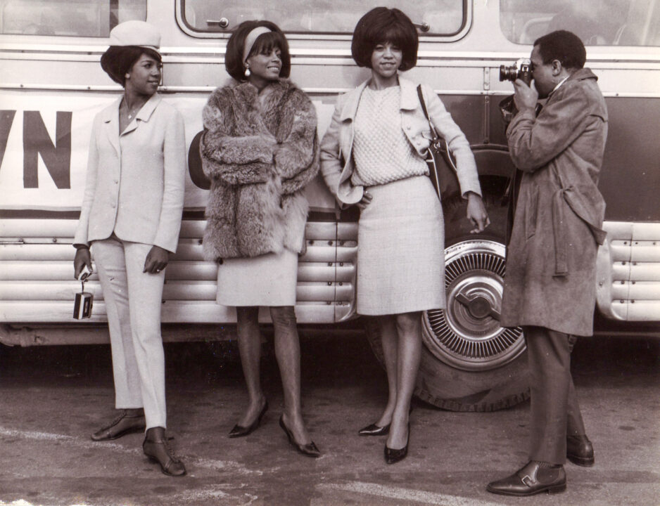 The Supremes at Le Bouget airport Paris, Berry Gordy Jr. taking picture, 1965, Gillles Pettard Collection 