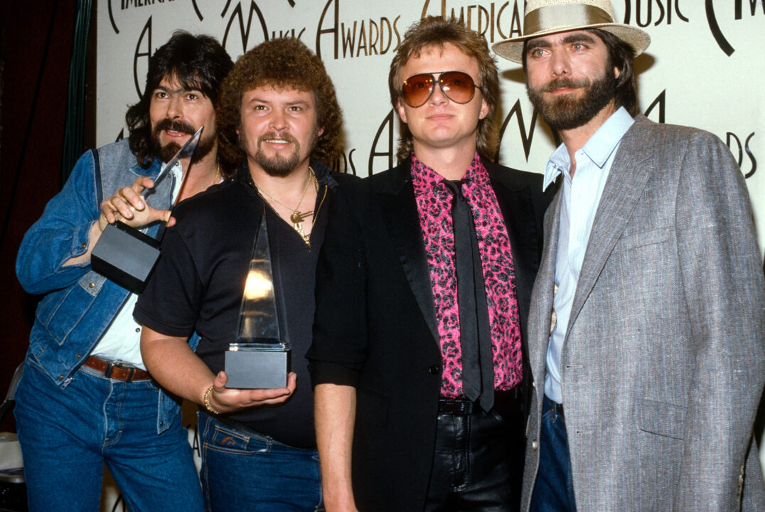 Randy Owen, Jeff Cook (1949 - 2022), Mark Herndon, Teddy Gentry of Alabama attend the American Music Awards circa 1985.
