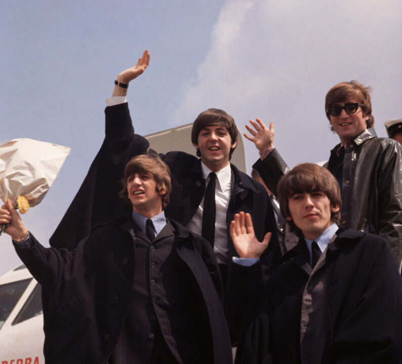 2nd July 1964: The Beatles, John Lennon, George Harrison (1943 - 2001), Paul McCartney and Ringo Starr, pictured on their arrival in London following a tour of Australia