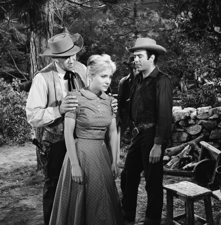 BONANZA -- "The Outcast" Episode 17 -- Aired 1/9/60 -- Pictured: (l-r) Lorne Greene as Ben Cartwright, Susan Oliver as Leta Malvet, Pernell Roberts as Adam Cartwright 