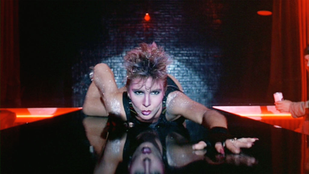 The movie "Flashdance", directed by Adrian Lyne. Seen here, Cynthia Rhodes as dancer Tina Tech. Initial theatrical release April 15, 1983. Screen capture. Paramount Pictures