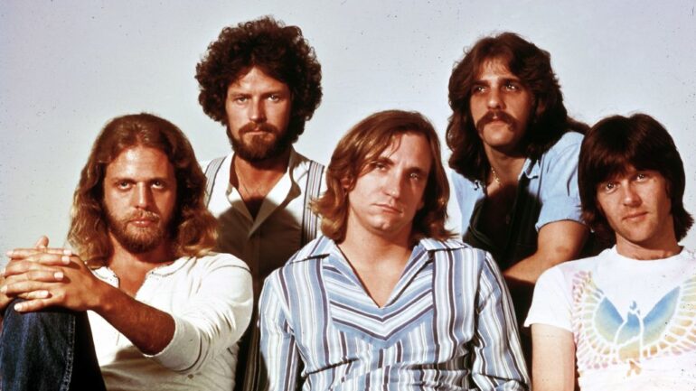 Photo of Glenn FREY and Joe WALSH and Don HENLEY and Don FELDER and EAGLES and Randy MEISNER; L-R: Don Felder, Don Henley, Joe Walsh, Glenn Frey, Randy Meisner - posed, studio, group shot - Hotel California era