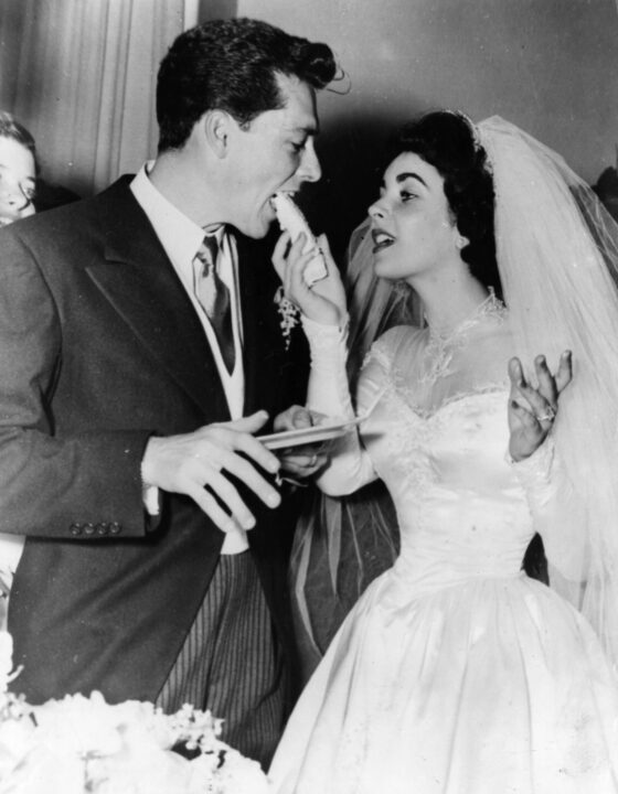 US film star Elizabeth Taylor and her first husband Nick Hilton, of the hotelier family, on their wedding day. 