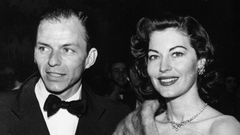 February 1952: American singer and actor Frank Sinatra (1915 - 1998) and the actress Ava Gardner (1922 - 1990) attending a Hollywood party. The two were married in 1948 and later divorced in 1957.