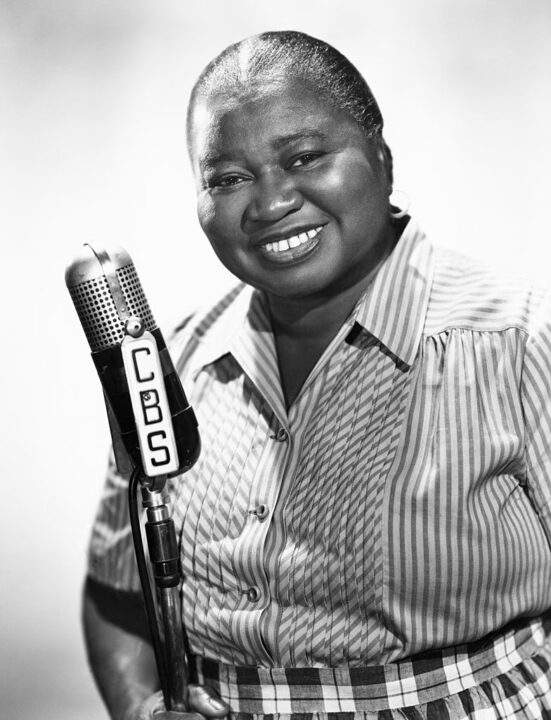 American actress Hattie McDaniel (1895 - 1952), at a CBS microphone, circa 1945. McDaniel won an Oscar for Best Supporting Actress for her role of Mammy in 'Gone With The Wind', making her the first African-American to win an Academy Award