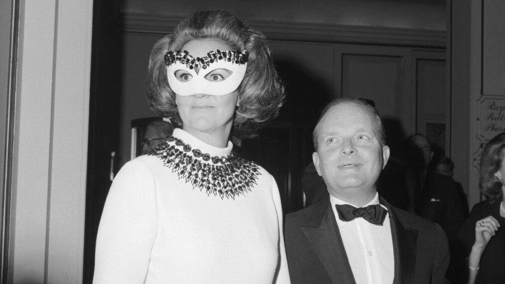 Author Truman Capote, host of a private party for 450, arrives at the Hotel Plaza holding hands with Mrs. Katherine Graham, the guest of honor. Mrs. Graham is the president of the Washington Post and Newsweek Magazine.