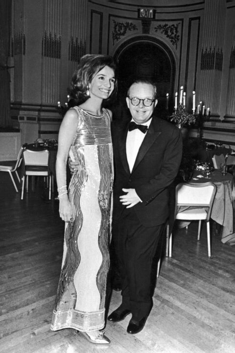 28th November 1966: American socialite Lee Radziwill and American writer Truman Capote (1924 - 1984) pose together in the Grand Ballroom of the Plaza Hotel during Capote's Black-and-White Ball in honor of publisher Kay Graham. 