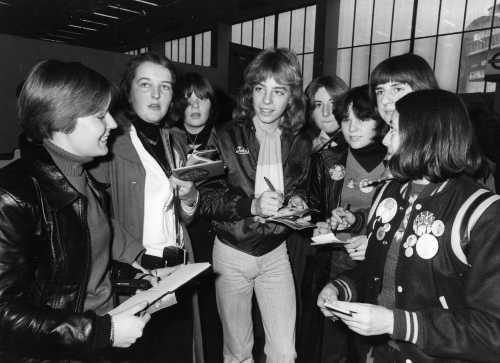 25th January 1978: Sixteen year old old Leif Garrett, the American pop singer signs autographs for fans on his arrival at Heathrow Airport, here to promote his first film 'Skateboard.' 