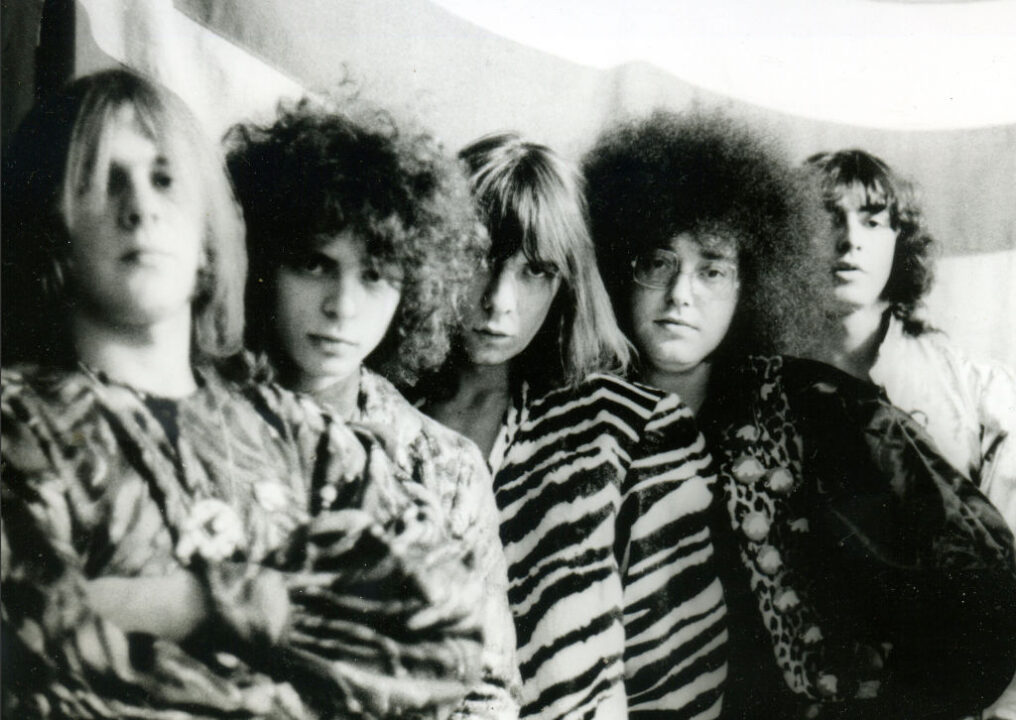 MC5 photographed in fancy costume, backstage in Ann Arbor, MI, in 1969